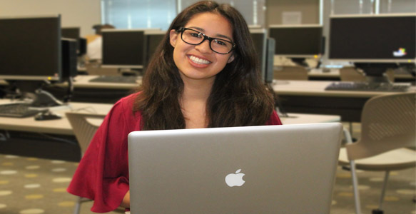 <span>College Bound</span><br>The Money Project helped Damaris learn important financial skills and, through her Individual Development Account, buy a laptop. The computer will help her with classes at Kenyon College in Ohio. Click here for more information about the Achievement Academy's "Money Project" program.