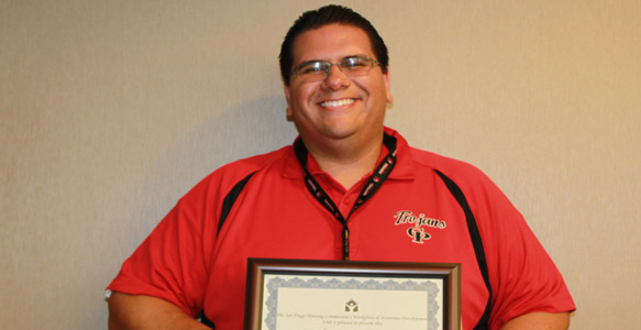 <span>Life Changing Experience</span><br>Less than five years ago, Eric was on welfare trying to provide for his three children.He graduated from the Family Self Sufficiency program offered at the SDHC Achievement Academy. He now heads a high school teaching department and holds a Master's degree in Education.